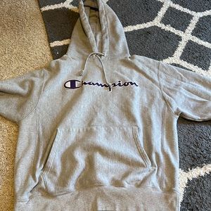 grey hoodie with purple champion writing